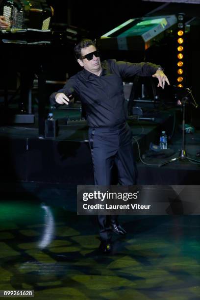 Laurent Gerra imitates Singer Maitre Gims during "Laurent Gerra Sans Moderation" at L'Olympia on December 27, 2017 in Paris, France.