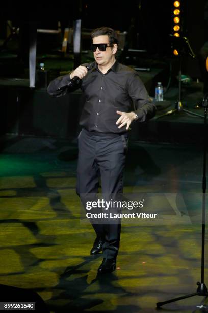 Laurent Gerra imitates Singer Maitre Gims during "Laurent Gerra Sans Moderation" at L'Olympia on December 27, 2017 in Paris, France.