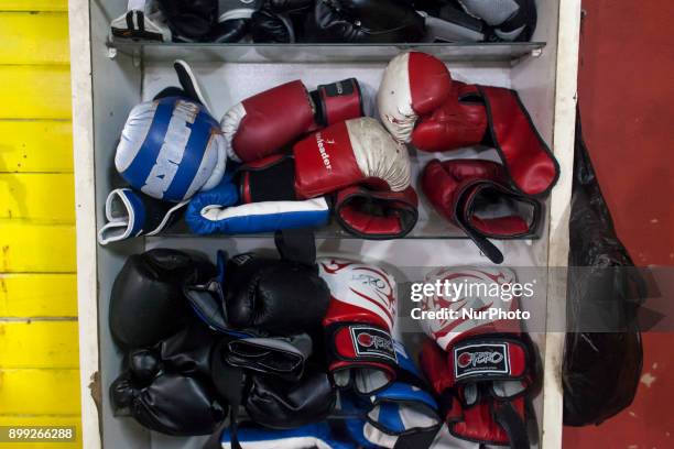 Boxing gloves are seen at the heart of the Eleuterio Ramírez town of Osorno, Chile on 27 December 2017, the School of Boxing directed by Carlos...