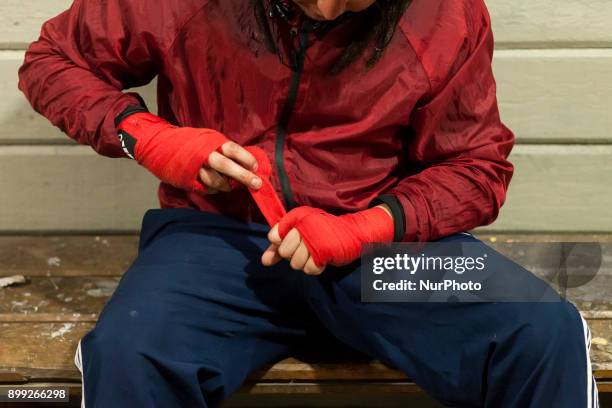 Young boxer prepares his hands bandage in Osorno, Chile on 27 December 2017. At the heart of the Eleuterio Ramírez town of Osorno is the School of...