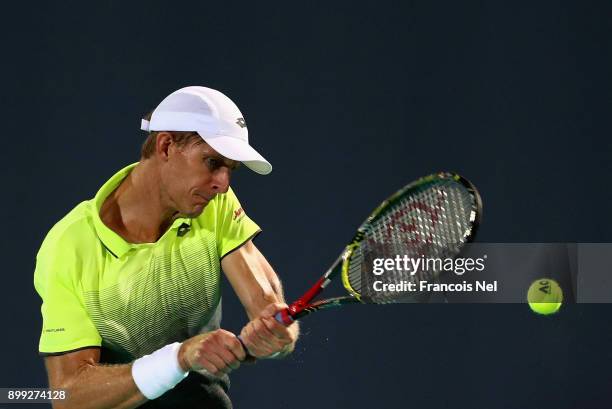 Kevin Anderson of South Africa in action during his men's singles match on day one of the Mubadala World Tennis Championship at International Tennis...