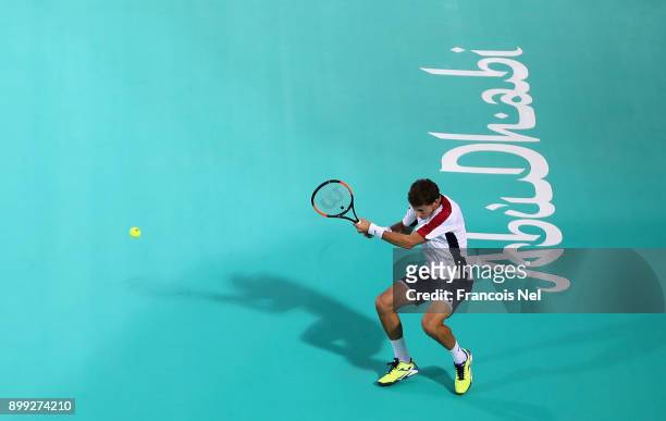 Pablo Carreno Busta of Spain in action against Kevin Anderson of South Africa during his men's singles match on day one of the Mubadala World Tennis...