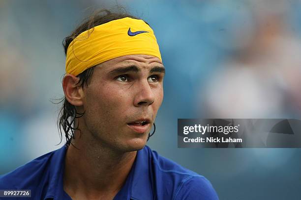 Rafael Nadal of Spain looks to the scoreboard against Andreas Seppi of Italy during day three of the Western & Southern Financial Group Masters on...