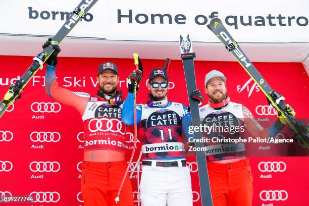 Aksel Lund Svindal of Norway takes 2nd place, Dominik Paris of Italy takes 1st place, Kjetil Jansrud of Norway takes 3rd place during the Audi FIS...
