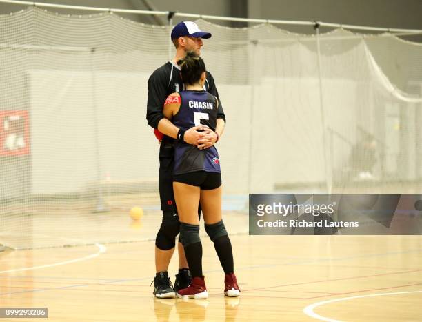 Markham, ON - OCTOBER, 20 USA's Nicole Chasin gets consoled following the loss. In a women's semi-final, Malaysia beat the USA in overtime 7-6. The...