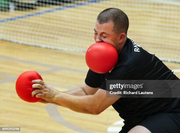 Markham, ON - OCTOBER, 20 Canada's Cameron Ranachan takes a ball off the face. In a men's semi-final, Canada beat the USA 10-9 in overtime and will...