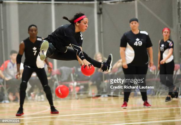 Markham, ON - OCTOBER, 20 Canada's Lisa Morra jumps high to avoid being hit. In a women's semi-final, Canada lost to Australia 11-5. The best...