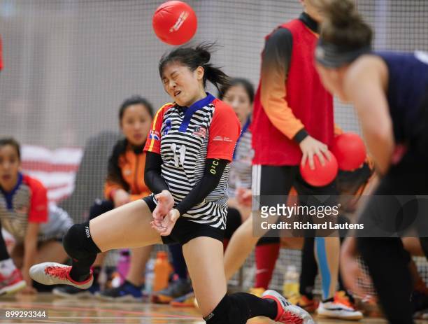 Markham, ON - OCTOBER, 20 Malaysia's Stella Cheah ducks a ball by a small margin. In a women's semi-final, Malaysia beat the USA in overtime 7-6. The...