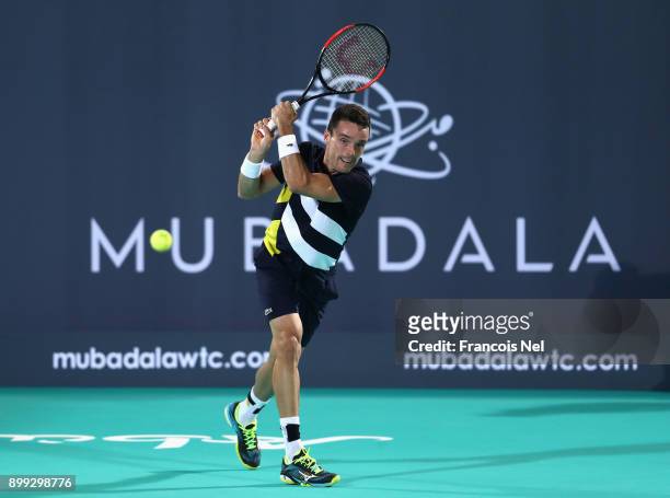 Roberto Bautista Agut of Spain in action against Andrey Rublev of Russia during his men's singles match on day one of the Mubadala World Tennis...