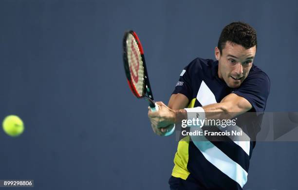 Roberto Bautista Agut of Spain in action against Andrey Rublev of Russia during his men's singles match on day one of the Mubadala World Tennis...