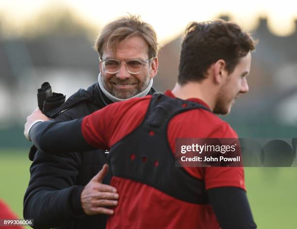 Jurgen Klopp manager of Liverpool with Danny Ward during a training session at Melwood Training Ground on December 28, 2017 in Liverpool, England.