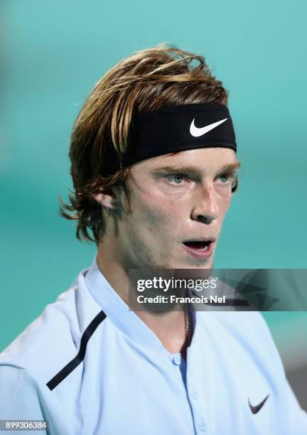 Andrey Rublev of Russia looks on against Roberto Bautista Agut of Spain during his men's singles match on day one of the Mubadala World Tennis...