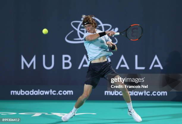 Andrey Rublev of Russia in action against Roberto Bautista Agut of Spain during his men's singles match on day one of the Mubadala World Tennis...