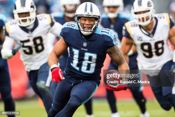 Wide receiver Rishard Matthews of the Tennessee Titans carries the ball during a NFL game against the Los Angeles Rams at Nissan Stadium on December...