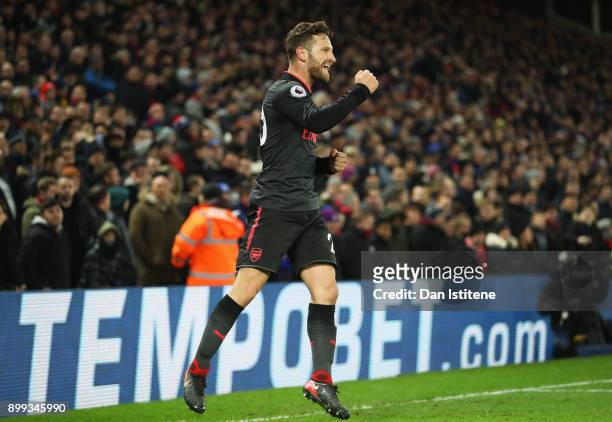 Shkodran Mustafi of Arsenal celebrates as he scores their first goal during the Premier League match between Crystal Palace and Arsenal at Selhurst...