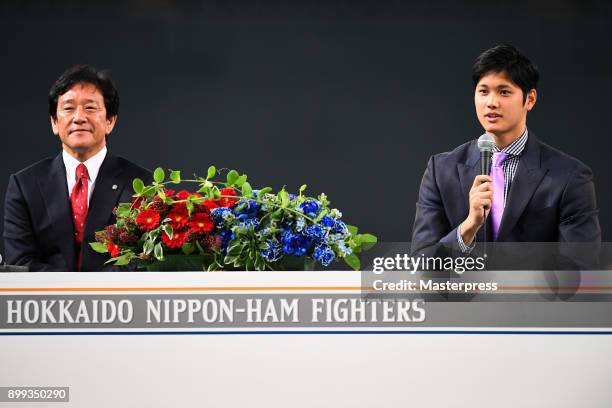 Shohei Ohtani of the Los Angeles Angels attends his farewell event with Hokkaido Nippon Ham Fighters head coach Hideki Kuriyama at Sapporo Dome on...
