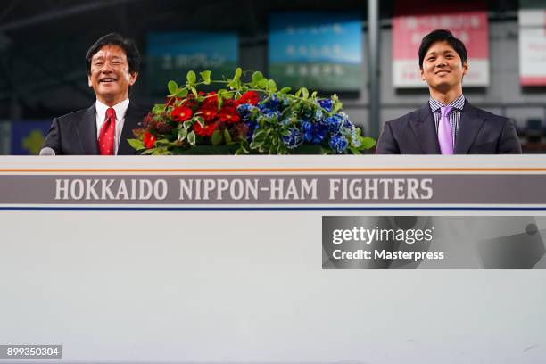 Shohei Ohtani of the Los Angeles Angels attends his farewell event with Hokkaido Nippon Ham Fighters head coach Hideki Kuriyama at Sapporo Dome on...