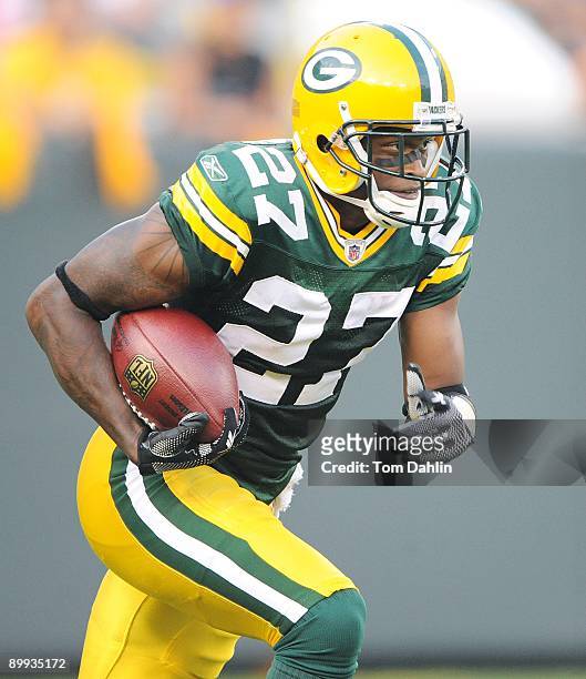 Will Blackmon of the Green Bay Packers receives a kickoff during an NFL preseason game against the Cleveland Browns at Lambeau Field, August 15, 2009...