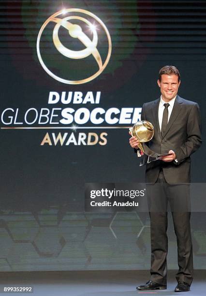 German referee Felix Brych receives 'Best Referee of the Year' award during the Globe Soccer Awards Ceremony at the end of the 12th Edition of the...