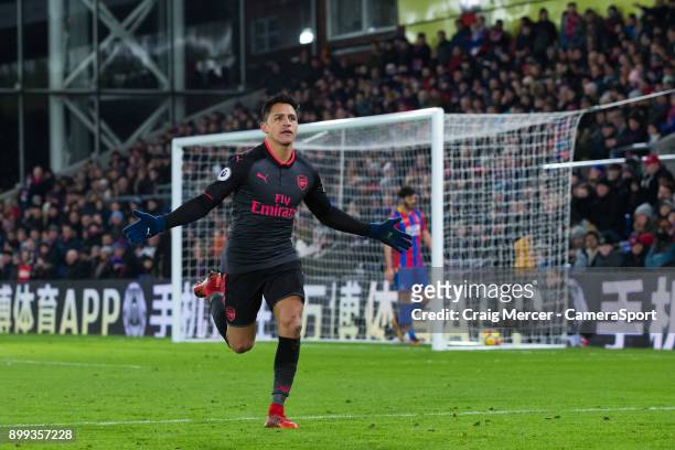 Arsenal's Alexis Sanchez celebrates scoring his side's third goal during the Premier League match between Crystal Palace and Arsenal at Selhurst Park...
