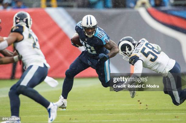 Tight end Delanie Walker of the Tennessee Titans carries the ball during a NFL game against the Los Angeles Rams at Nissan Stadium on December 24,...
