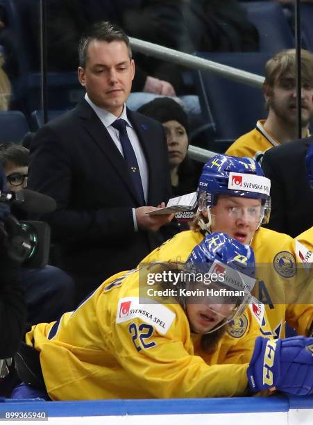 Sweden head coach Tomas Monten watches play in the first period against Czech Republic during the IIHF World Junior Championship at KeyBank Center on...