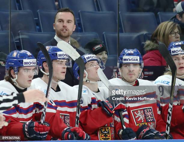 Czech Republic head coach Filip Pesan watches play against Sweden in the first period during the IIHF World Junior Championship at KeyBank Center on...