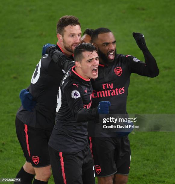 Alexis Sanchez celebrates scoring Arsenal's 2nd goal with Granit Xhaka, Shkodran Mustafi and Alexandre Lacazette during the Premier League match...