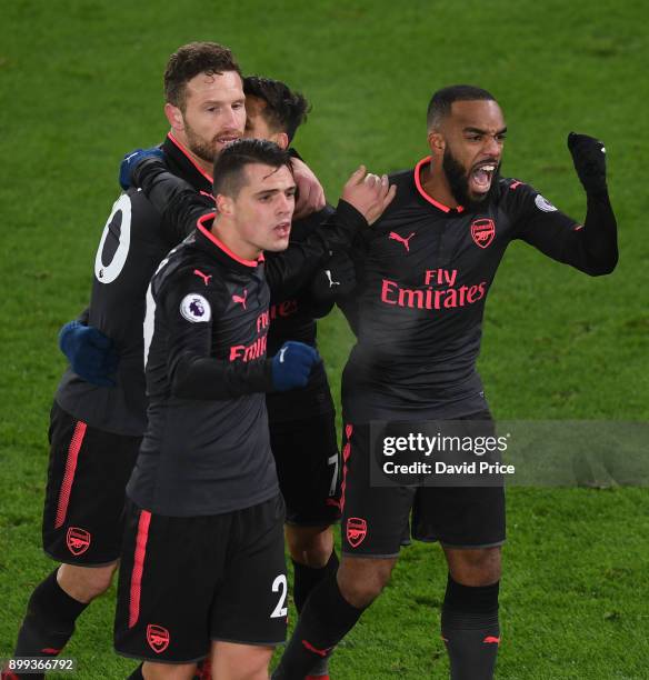 Alexis Sanchez celebrates scoring Arsenal's 2nd goal with Granit Xhaka, Shkodran Mustafi and Alexandre Lacazette during the Premier League match...