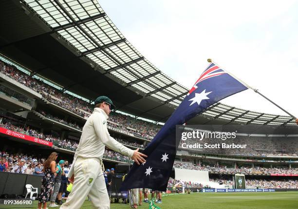 Steve Smith, captain of Australia leads his side onto the field during day three of the Fourth Test Match in the 2017/18 Ashes series between...