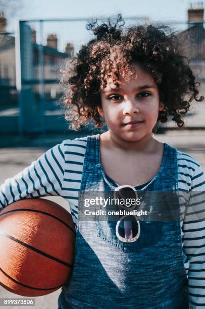 portrait child with basketball - onebluelight stock pictures, royalty-free photos & images