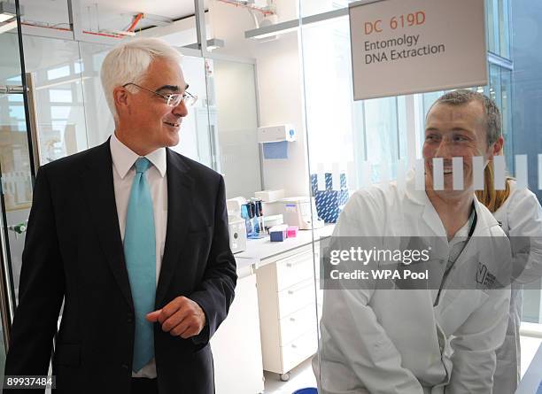 British Chancellor Alistair Darling meets botanists during his vist he to the new Darwin Centre at the National History Museum on August 19, 2009 in...