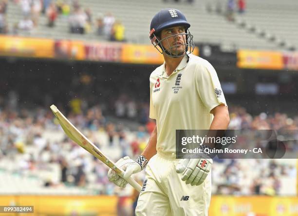 Alastair Cook of England walks off the field on 244 not out during day four of the Fourth Test Match in the 2017/18 Ashes series between Australia...