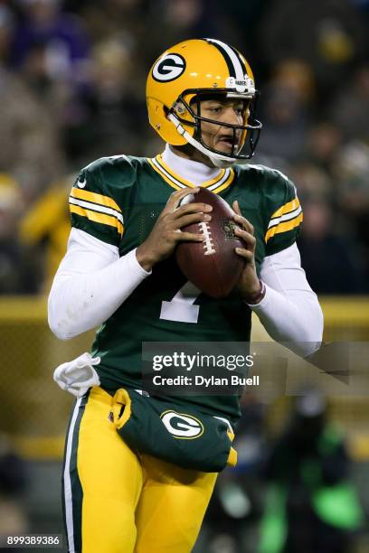 Brett Hundley of the Green Bay Packers drops back to pass in the second quarter against the Minnesota Vikings at Lambeau Field on December 23, 2017...