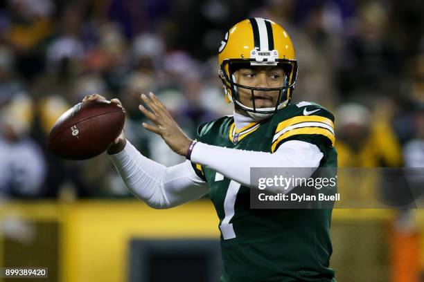 Brett Hundley of the Green Bay Packers throws a pass in the second quarter against the Minnesota Vikings at Lambeau Field on December 23, 2017 in...