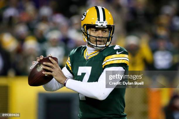 Brett Hundley of the Green Bay Packers drops back to pass in the second quarter against the Minnesota Vikings at Lambeau Field on December 23, 2017...