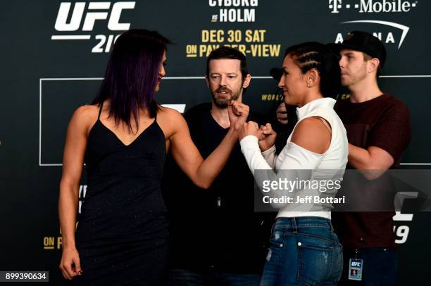 Cynthia Calvillo and Carla Esparza face off for the media during the UFC 219 Ultimate Media Day inside T-Mobile Arena on December 28, 2017 in Las...