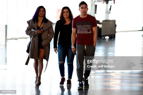 Cynthia Calvillo arrives with coach Justin Buchholz during the UFC 219 Ultimate Media Day inside T-Mobile Arena on December 28, 2017 in Las Vegas,...