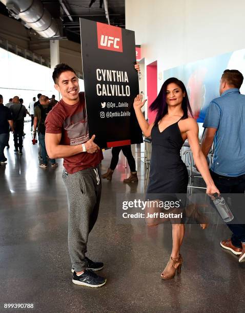 Cynthia Calvillo and coach Justin Buchholz pose for a photo during the UFC 219 Ultimate Media Day inside T-Mobile Arena on December 28, 2017 in Las...