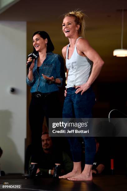 Host Megan Olivi interacts with Holly Holm after an open training session for fans and media during the UFC 219 Open Workouts inside T-Mobile Arena...