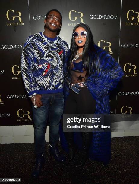 Gucci Mane and Keyshia Ka'oir attend the Gucci Mane "El Gato The Human Glacier" album release party at Gold Room on December 22, 2017 in Atlanta,...