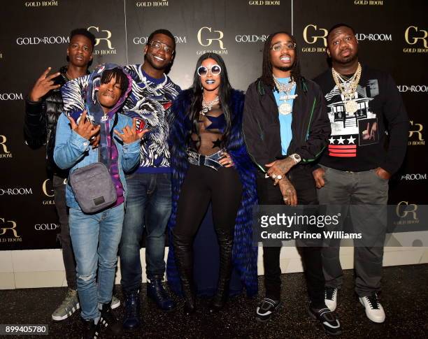 Gucci Mane, Keyshia Ka'oir, Quavo and Pierre 'Pee' Thomas attend the Gucci Mane "El Gato The Human Glacier" album release party at Gold Room on...
