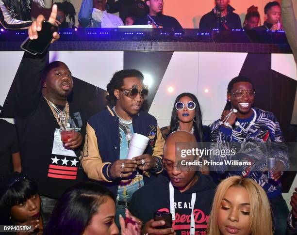 Pierre 'Pee' Thomas, Takeoff, Keyshia Ka'oir and Gucci Mane attend the Gucci Mane "El Gato The Human Glacier" album release party at Gold Room on...