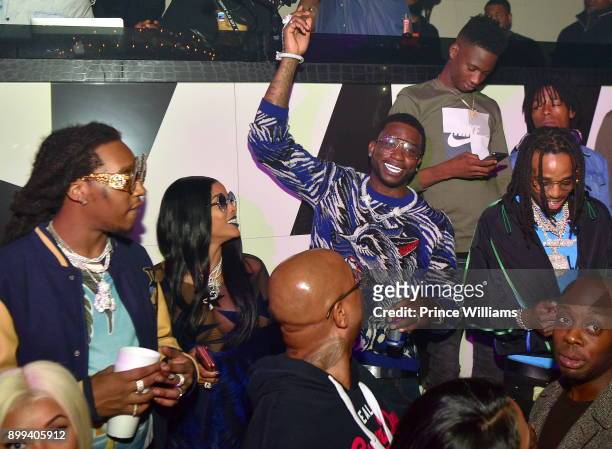 Takeoff, Keyshia Ka'oir, Gucci Mane and Quavo attend the Gucci Mane "El Gato The Human Glacier" album release party at Gold Room on December 22, 2017...