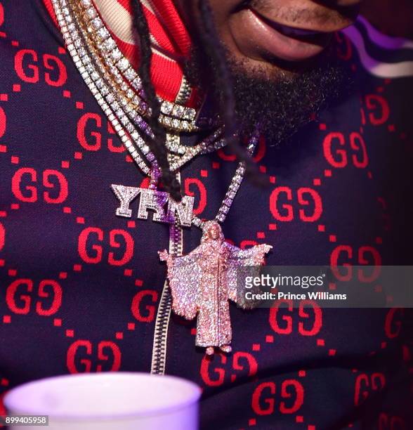 Offset of the Migos, Necklace Detail attends the Gucci Mane "El Gato The Human Glacier" album release party at Gold Room on December 22, 2017 in...