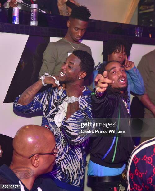 Gucci Mane and Quavo of The Migos attend the Gucci Mane "El Gato The Human Glacier" album release party at Gold Room on December 22, 2017 in Atlanta,...