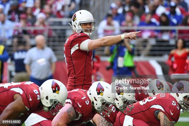 Drew Stanton of the Arizona Cardinals calls a play from the line of scrimmage against the New York Giants at University of Phoenix Stadium on...