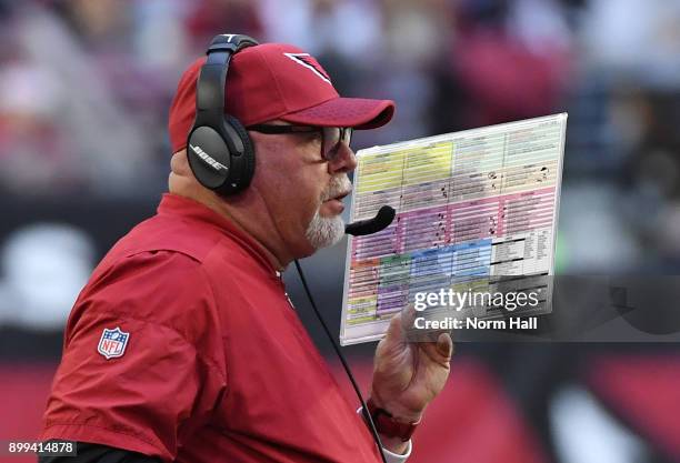 Head coach Bruce Arians of the Arizona Cardinals calls in a play against the New York Giants at University of Phoenix Stadium on December 24, 2017 in...