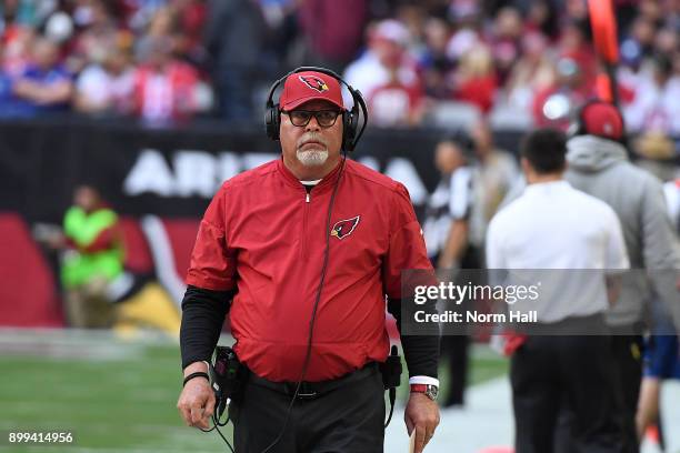 Head coach Bruce Arians of the Arizona Cardinals walks along the sidelines against the New York Giants at University of Phoenix Stadium on December...