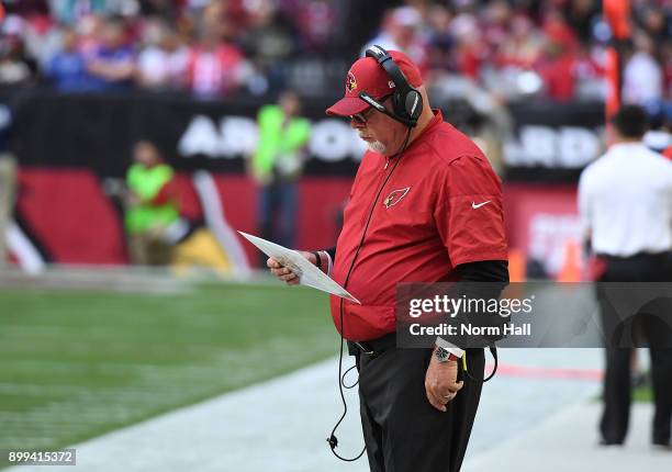 Head coach Bruce Arians of the Arizona Cardinals calls in a play against the New York Giants at University of Phoenix Stadium on December 24, 2017 in...